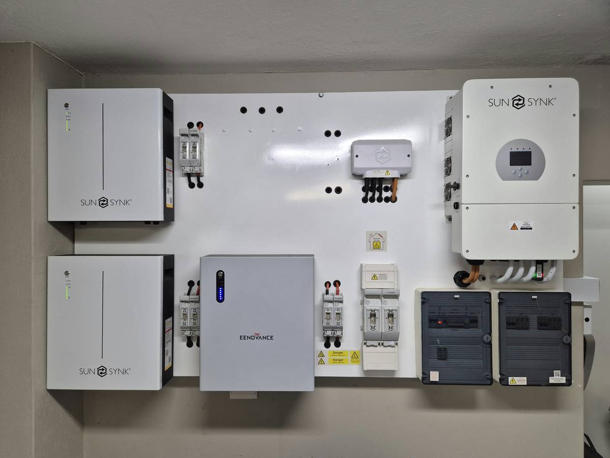 Renewable resource charge controller type pwm installed in a home solar setup with labeled terminals and battery connections